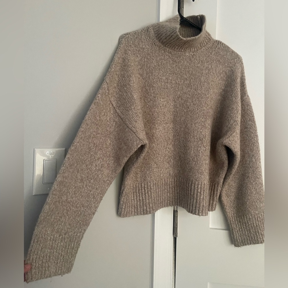 Casual beige sweater, in perfect condition worn once.